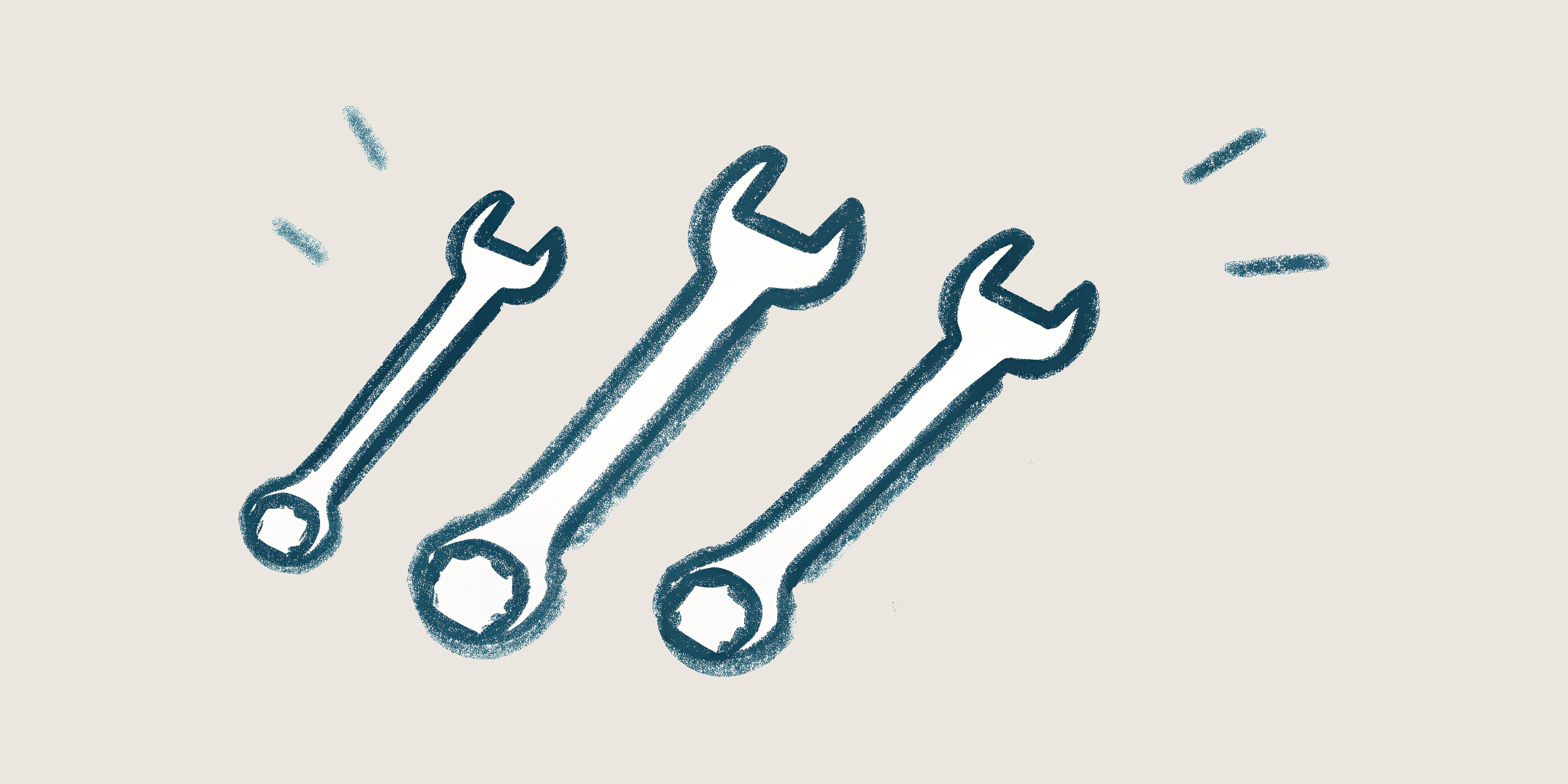 A hand-drawn set of three wrenches in different sizes, lying side by side